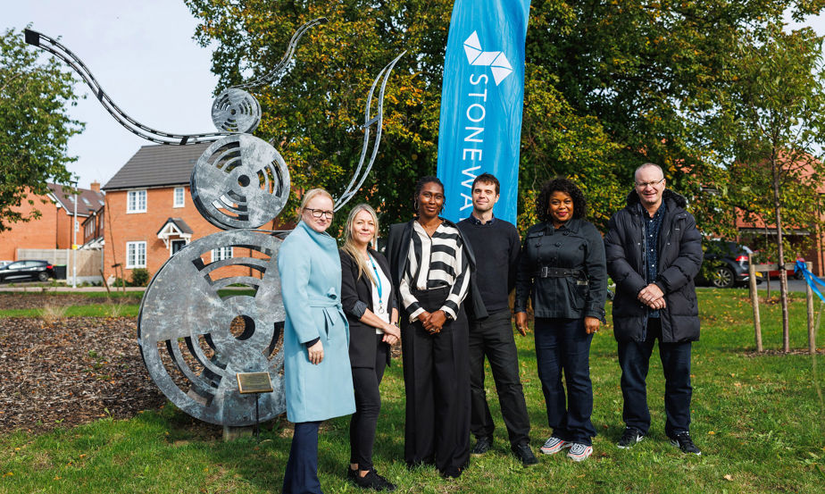 Artist Hammer And Tongs with their sculpture in Cardington, Bedfordshire